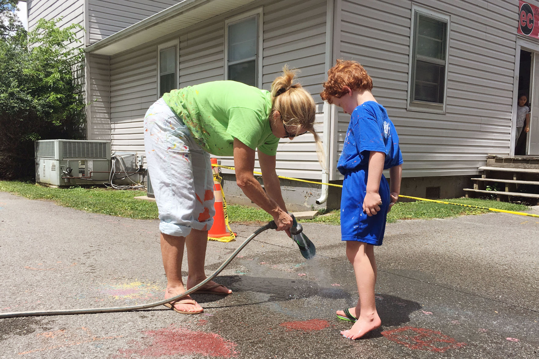 3 - Bita Jordan rinsing son Henry ADJ.jpg